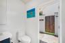The Casita half bath has a doorway that leads to the outside shower with has both hot and cold water.