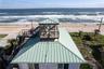 Oceanview Observatory. Birds eye view of rocket launches, surfers and marine life, as far as the eye can see...