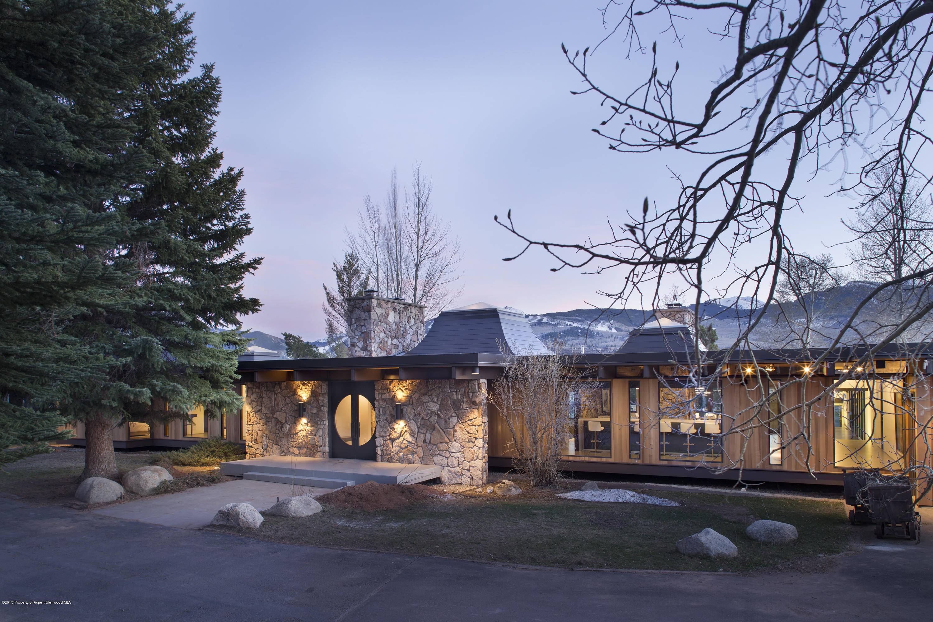 Remodeled in 2014, this beautiful, custom contemporary 5 bedroom home on McLain Flats features floor to ceiling windows encompassing 180 degree views of ski mountains from Aspen to Snowmass.