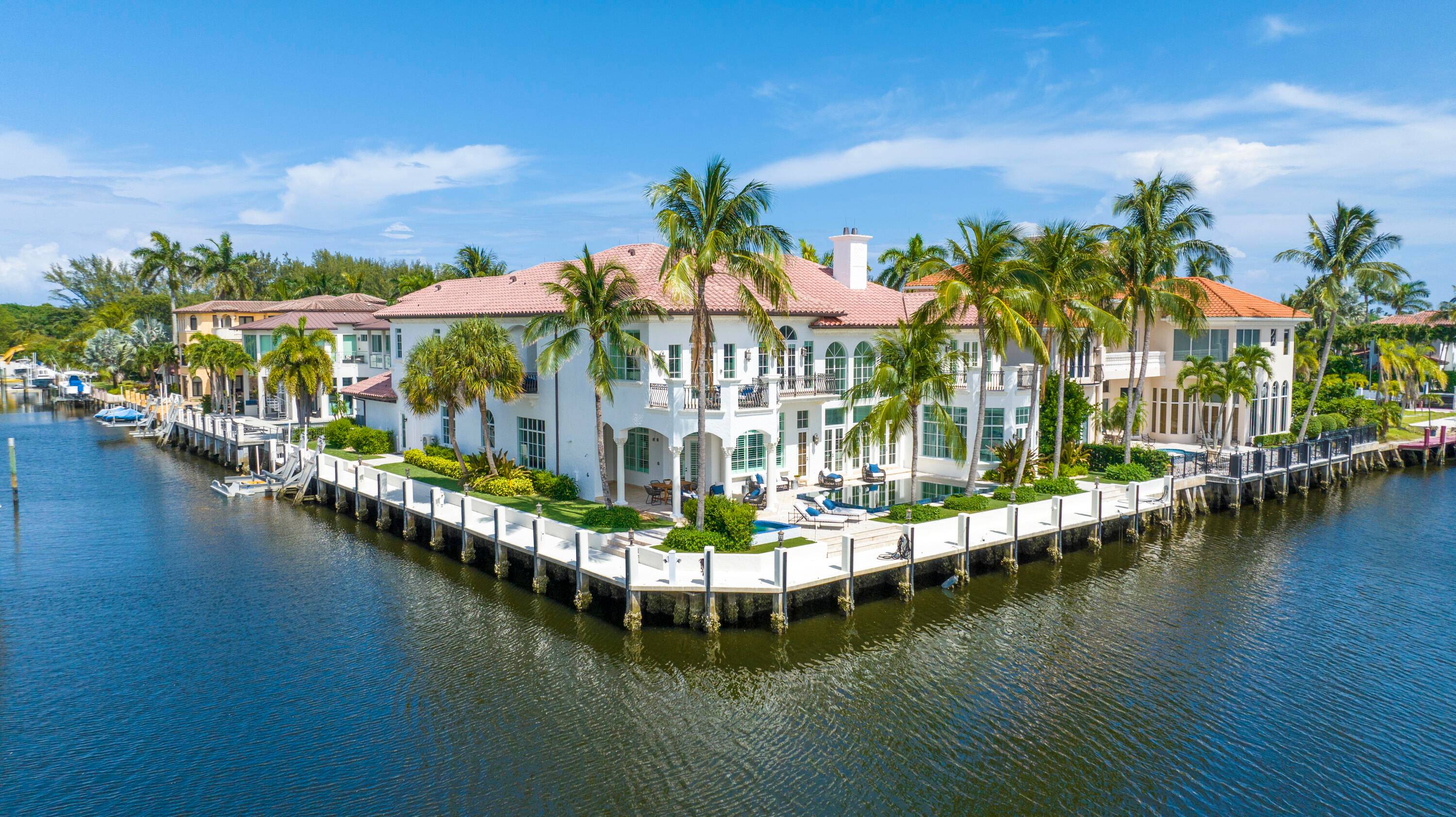 Located at the end of a cul de sac on a premier point lot with 243 feet of waterfront and dockage on both the Intracoastal Waterway and a side canal, ...