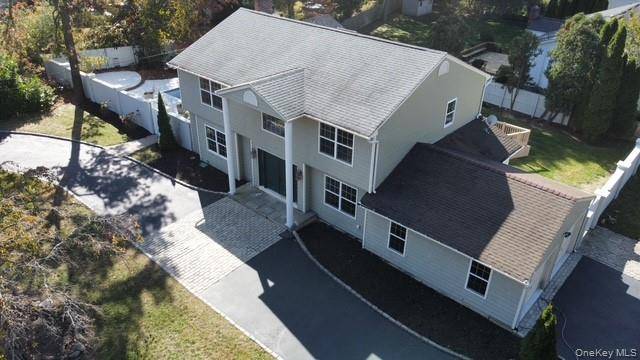Luxury Corner Colonial in Lake Grove, Long Island Elegant 4 bedroom colonial with premium finishes and exceptional craftsmanship plus a flexible room easily convertible to a 5th bedroom, office, or ...