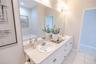 Dual sinks, soaking tub and separate shower- designed for comfort.