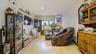 Living room featuring light wood-style floors and recessed lighting