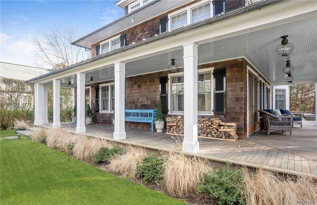 This turnkey East Hampton Village property features a 4 bedroom, 3.