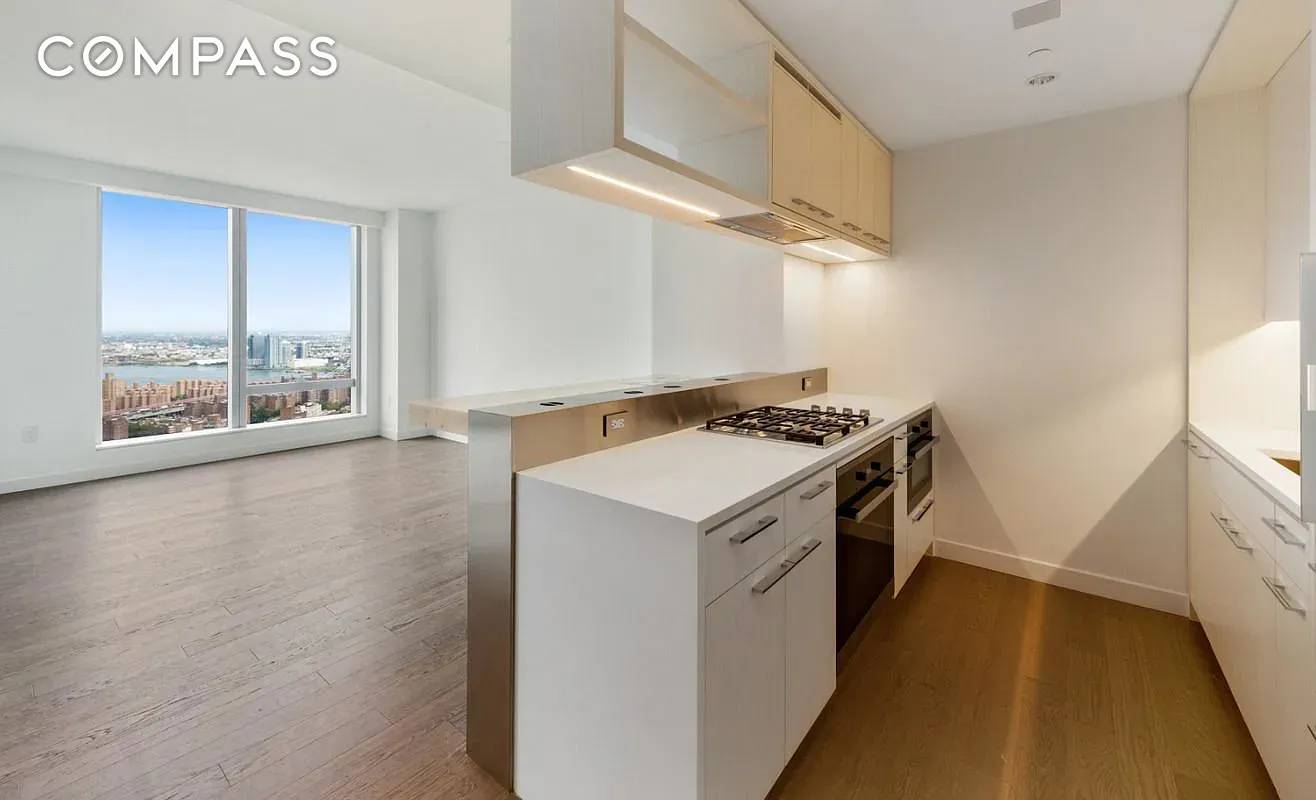 UNIT COMES FURNISHED ! ! Experience the epitome of luxury living in One Manhattan Square with stunning skyline views of Manhattan and East River.