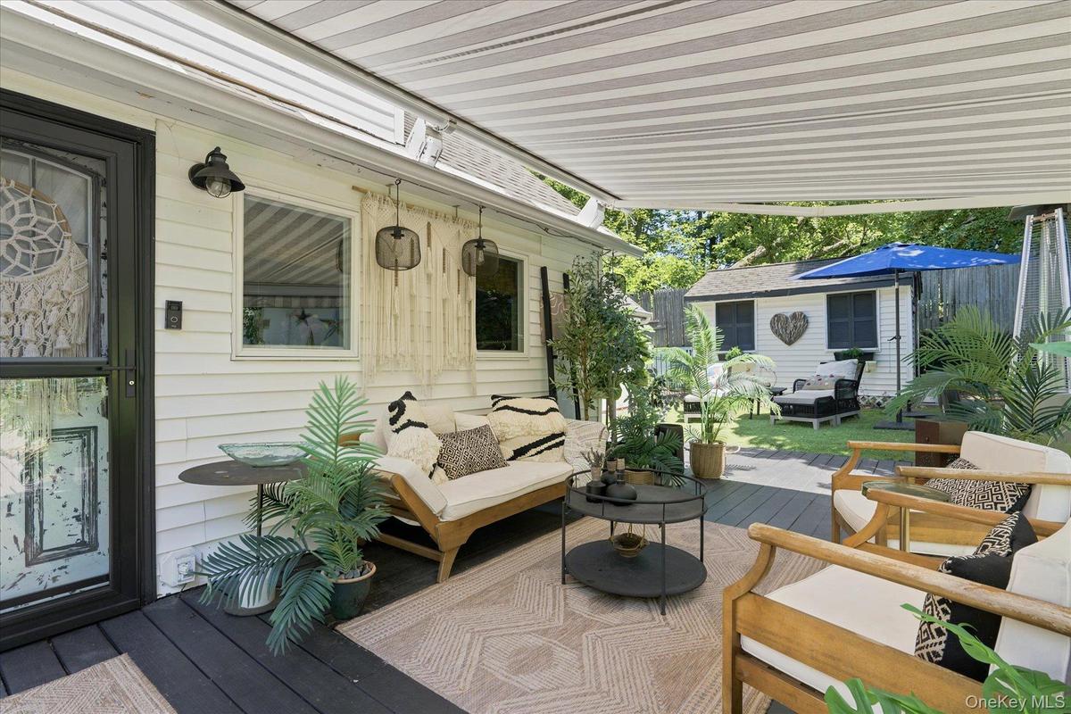 Retractable awning makes your deck like a private courtyard in all seasons and all types of weather