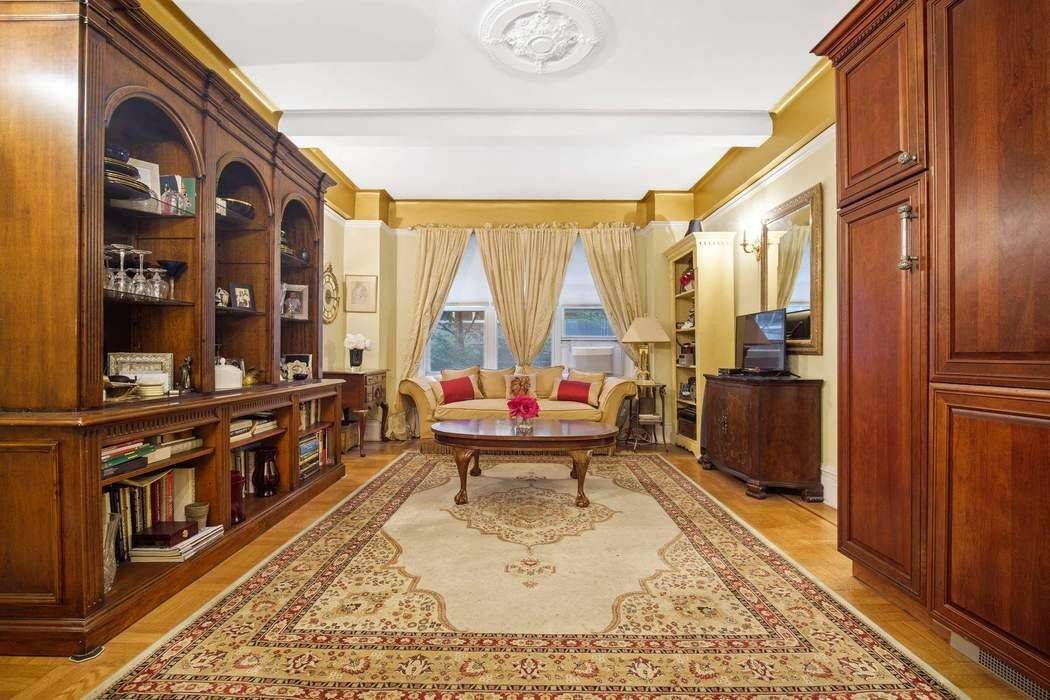 Welcome home to 2D, an inviting one bedroom Prewar apartment with beamed ceilings, crown moldings and hardwood floors.