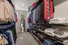 Primary walk-in closet with Elfa closet system