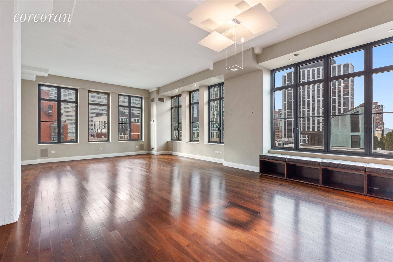 This stunning loft like apartment has a sprawling 42 ft corner living dining room with open kitchen and fabulous oversized windows facing South and West which provide breathtaking city and ...