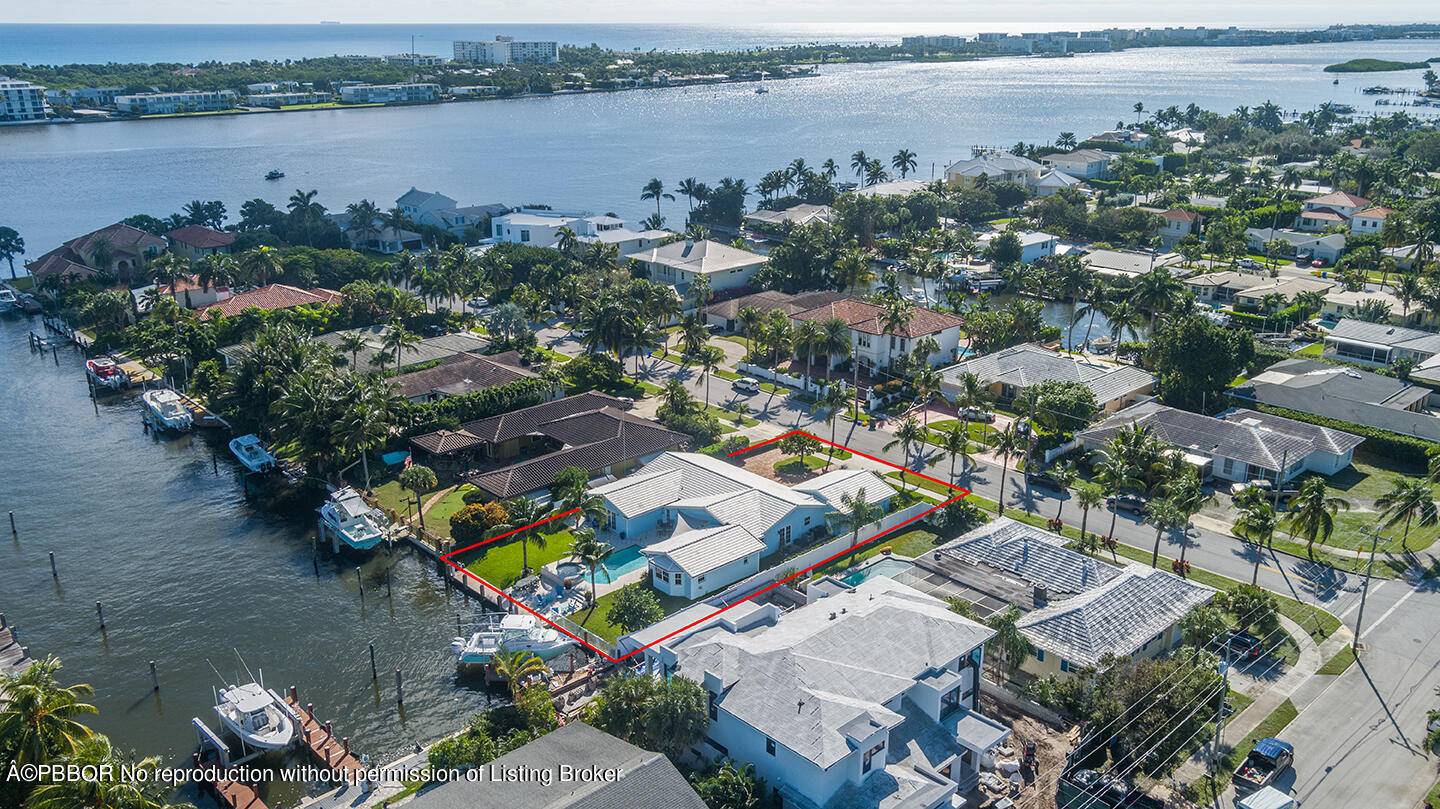 Open and airy, this magnificent Lake Worth Beach waterfront home was built for entertaining !