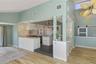 Kitchen designed for entertaining with custom buffet bar facing the dining area