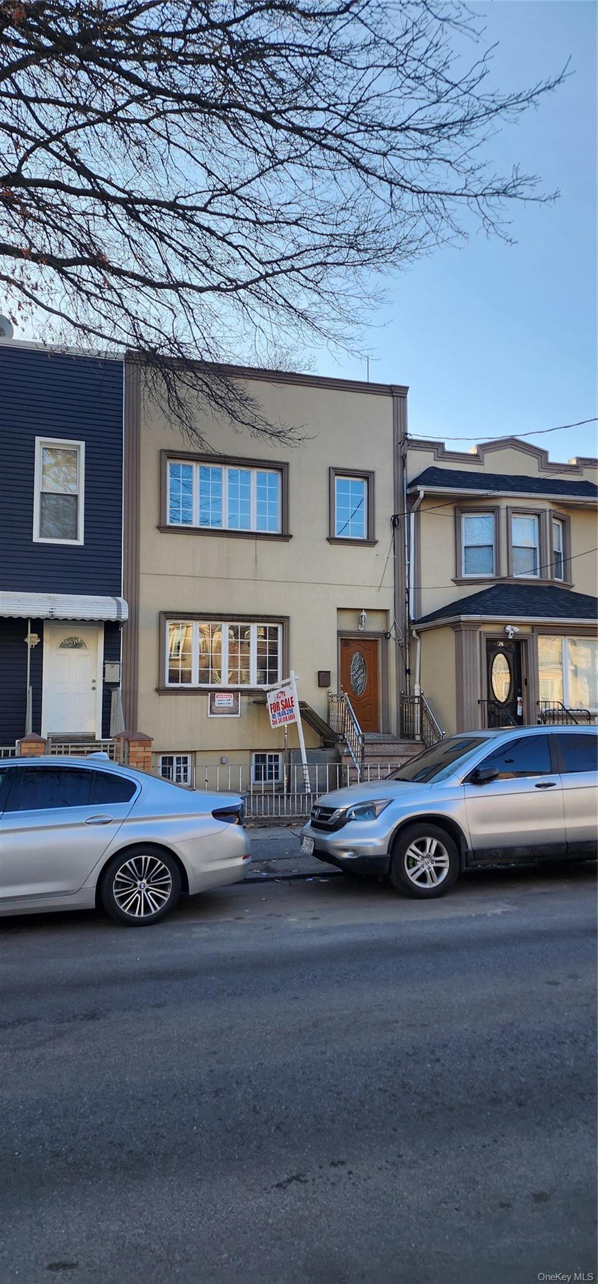View of front of house featuring stucco siding