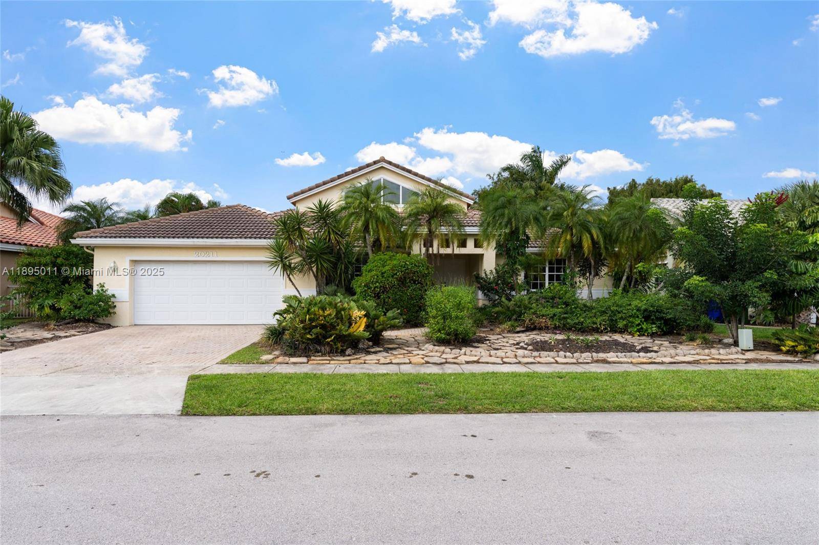Beautiful 4 Bed 2. 5 Bath home with a pool and serene water view.