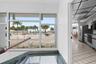 Second Entry Through Kitchen Directly To Pool