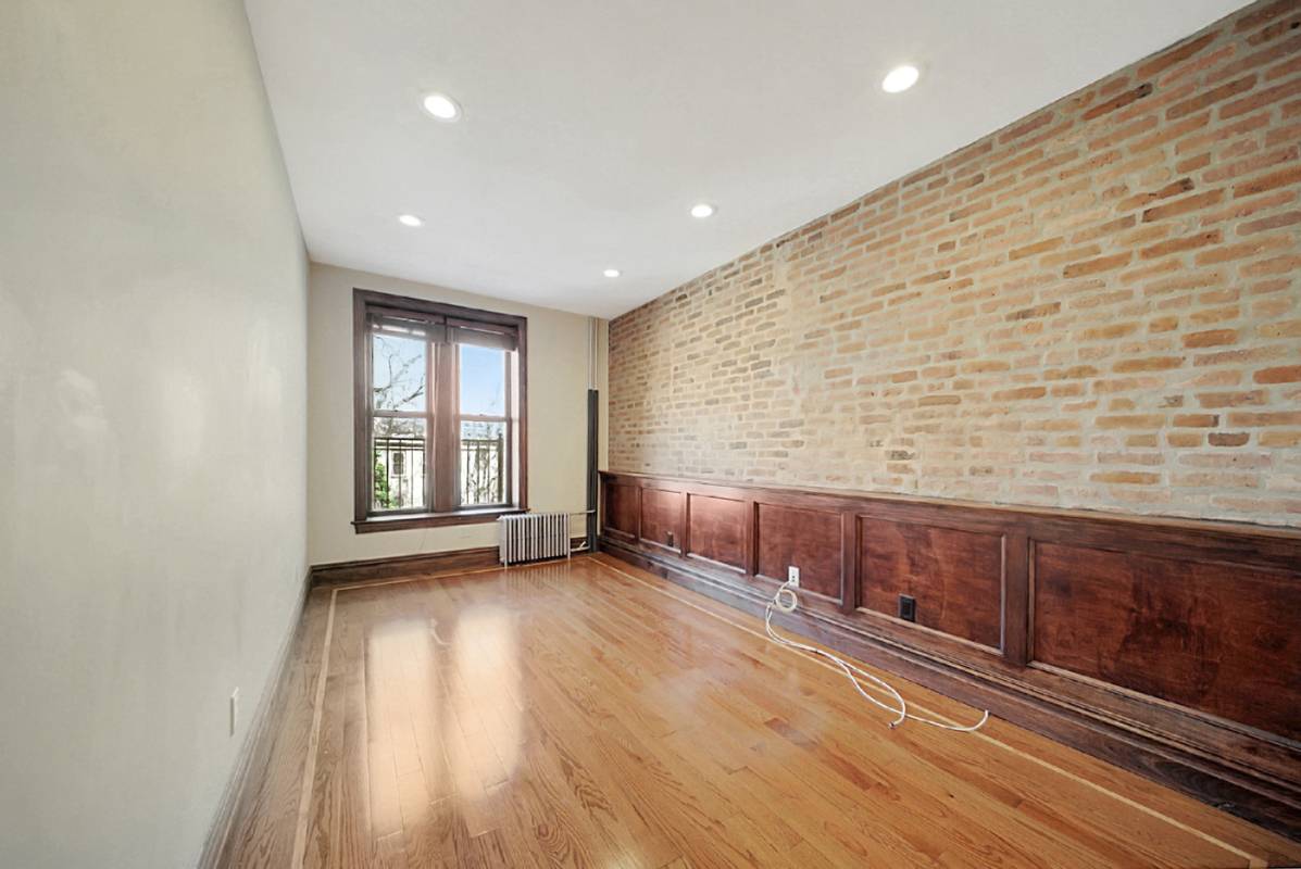 RENOVATED TWO BEDROOM ON TREE LINE BLOCK WITH WASHER AND DRYER Stunning renovation, this prime Park Slope townhouse offers custom cherry wood cabinetry with stainless steel appliances including dishwasher.