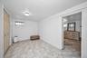 Unfurnished bedroom with a closet and baseboards
