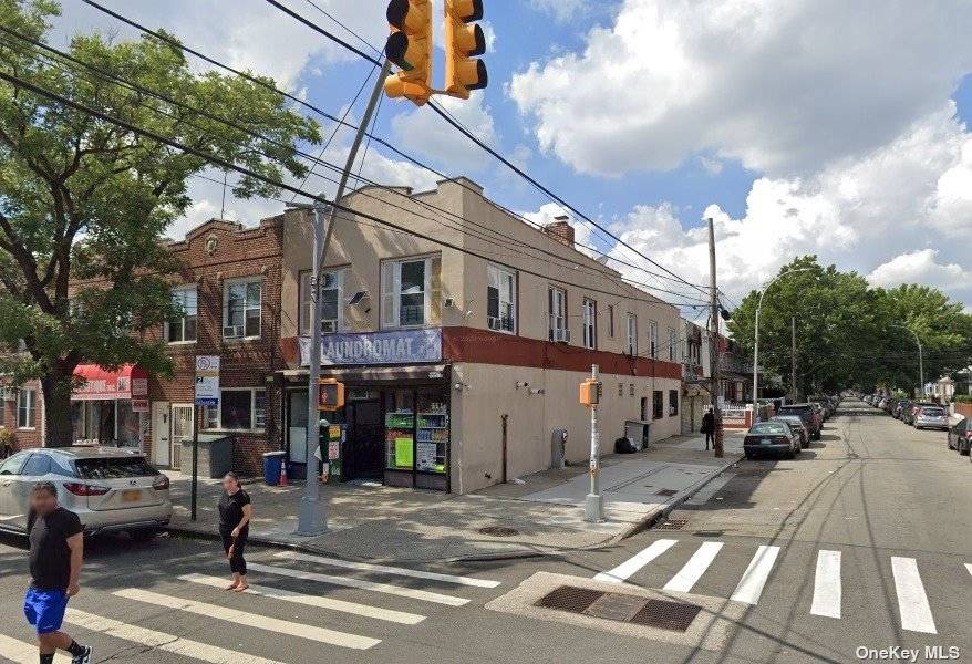 Excellent mixed use corner property in Ozone Park, featuring One storefront, one 1 bedroom unit, two 2 bedroom units and a garage.