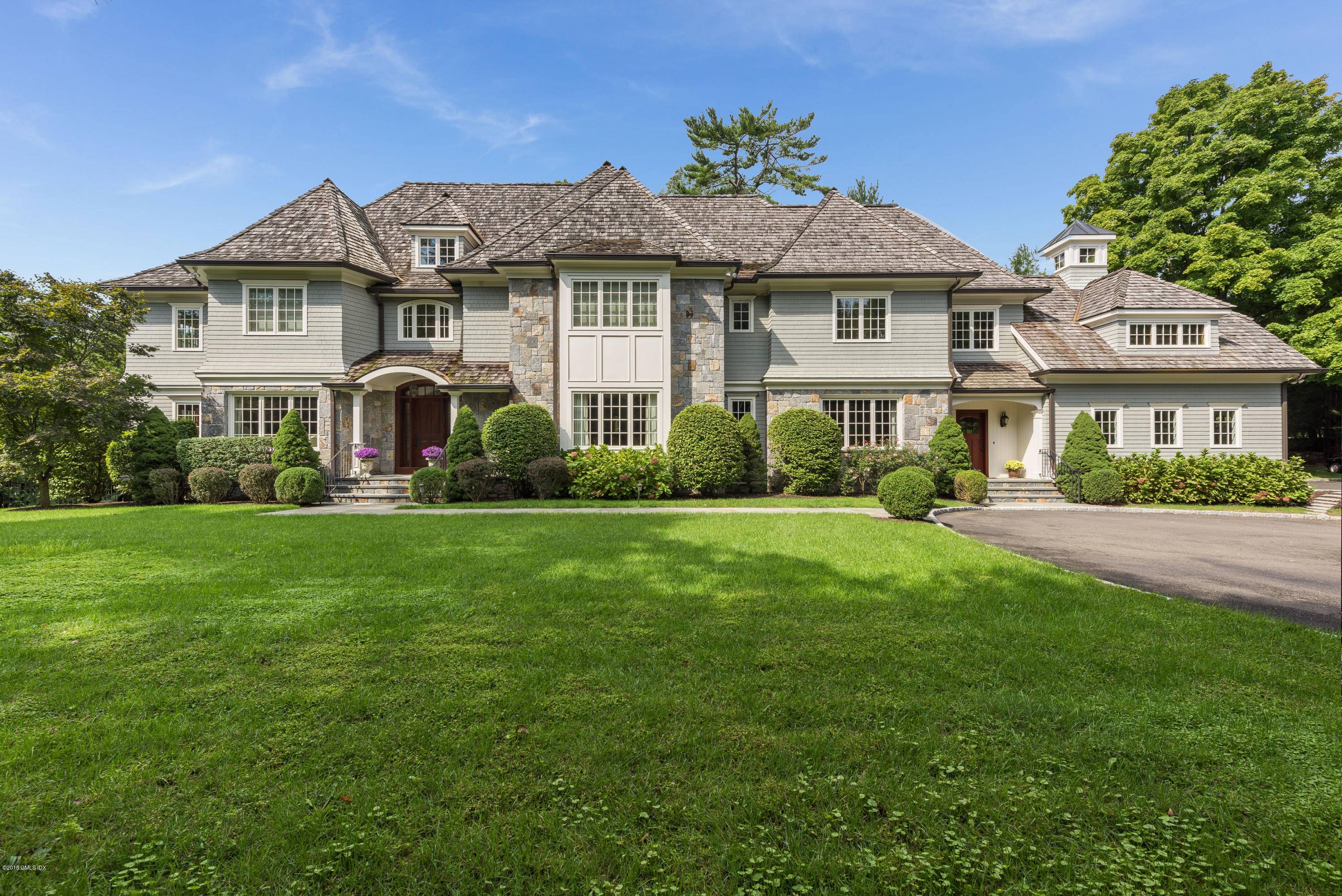 Classic elegance defines this sundrenched four five bedroom home poised on a 1.