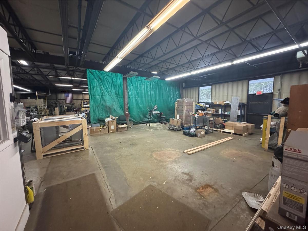 Misc room with a garage