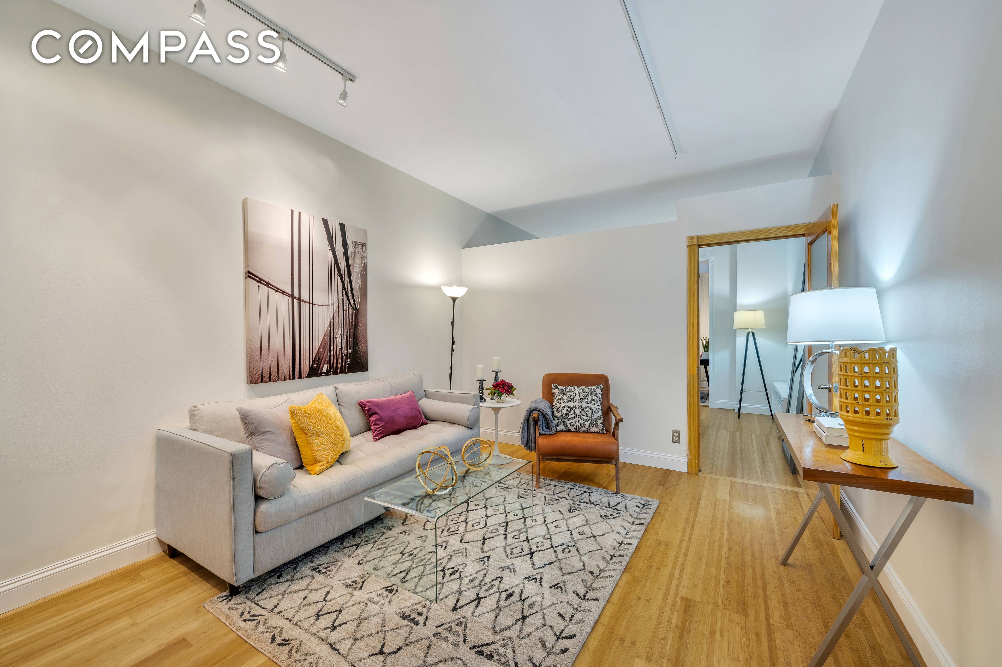 Loft like gem with ten foot ceilings, hardwood floors and an incredibly versatile layout.