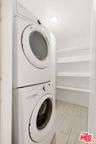 Laundry area with shelves