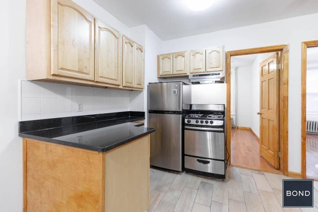 Nicely updated three bedroom apartment with granite and stainless steel kitchen !