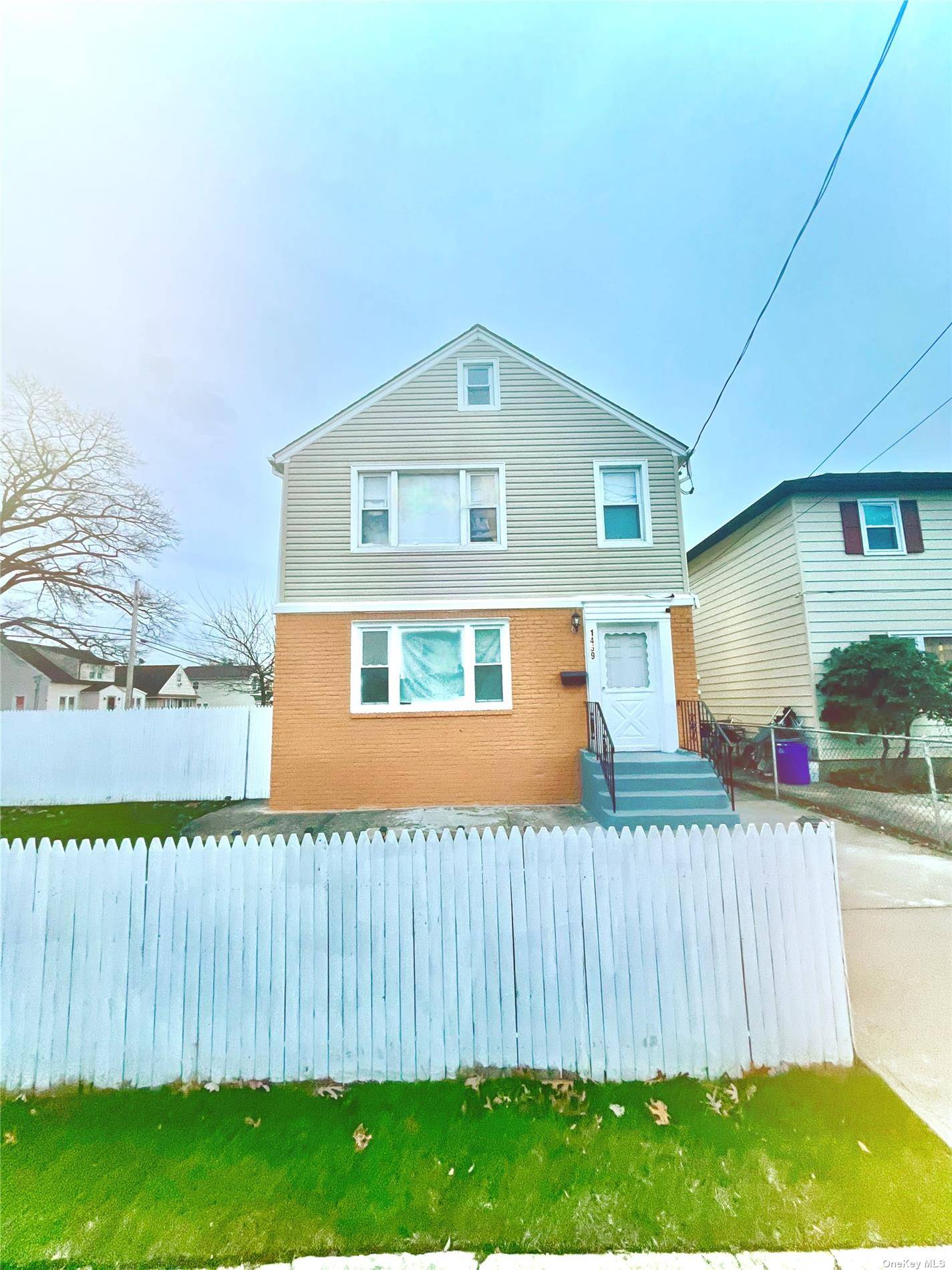 Welcome to this Beautifully Renovated 2 Family corner property in Elmont.