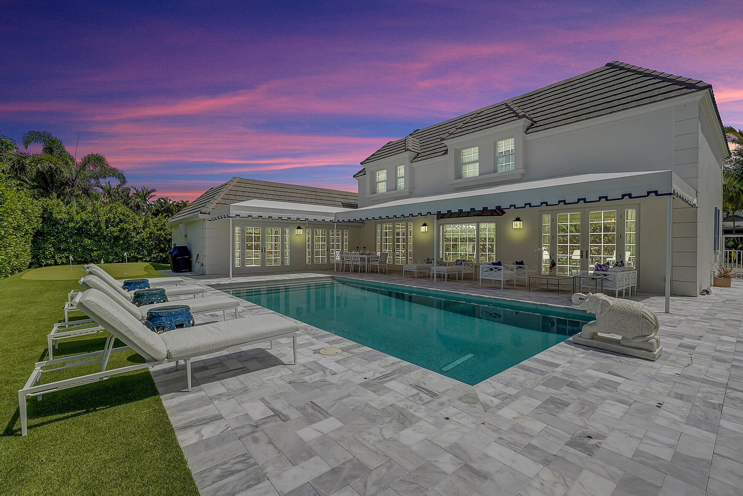 This elegantly renovated, turnkey family residence epitomizes luxury Florida living at its finest.