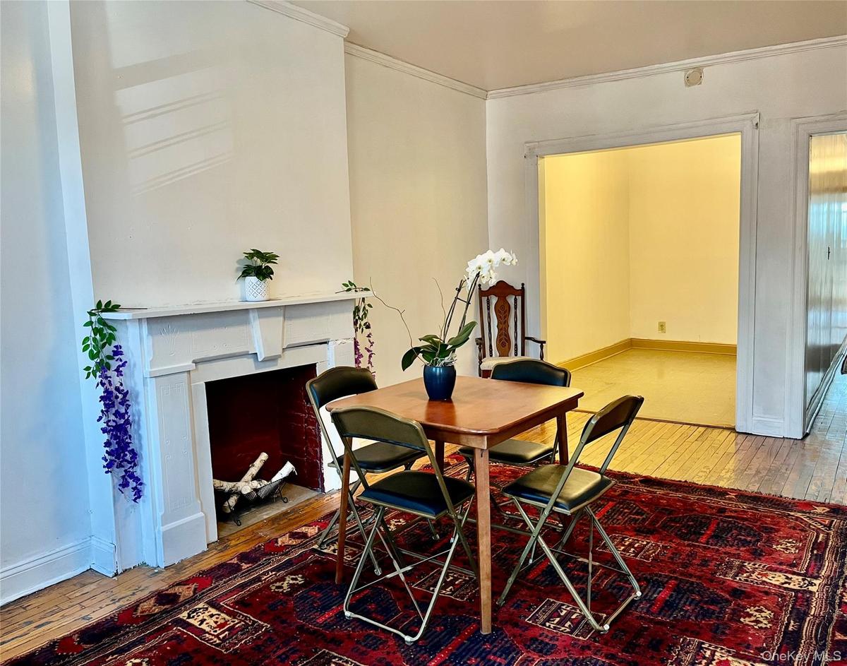 Beyond the livingroom is the 2nd bedroom on the left.