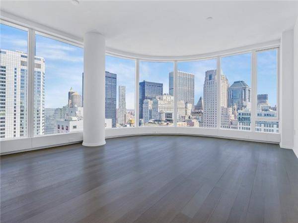 Newly built spectacular luxury Glass building in downtown ; Located at 39th Floor, 1736 square feet modern three bedroom, three bathroom corner home ; 10 foot high ceilings with expansive ...