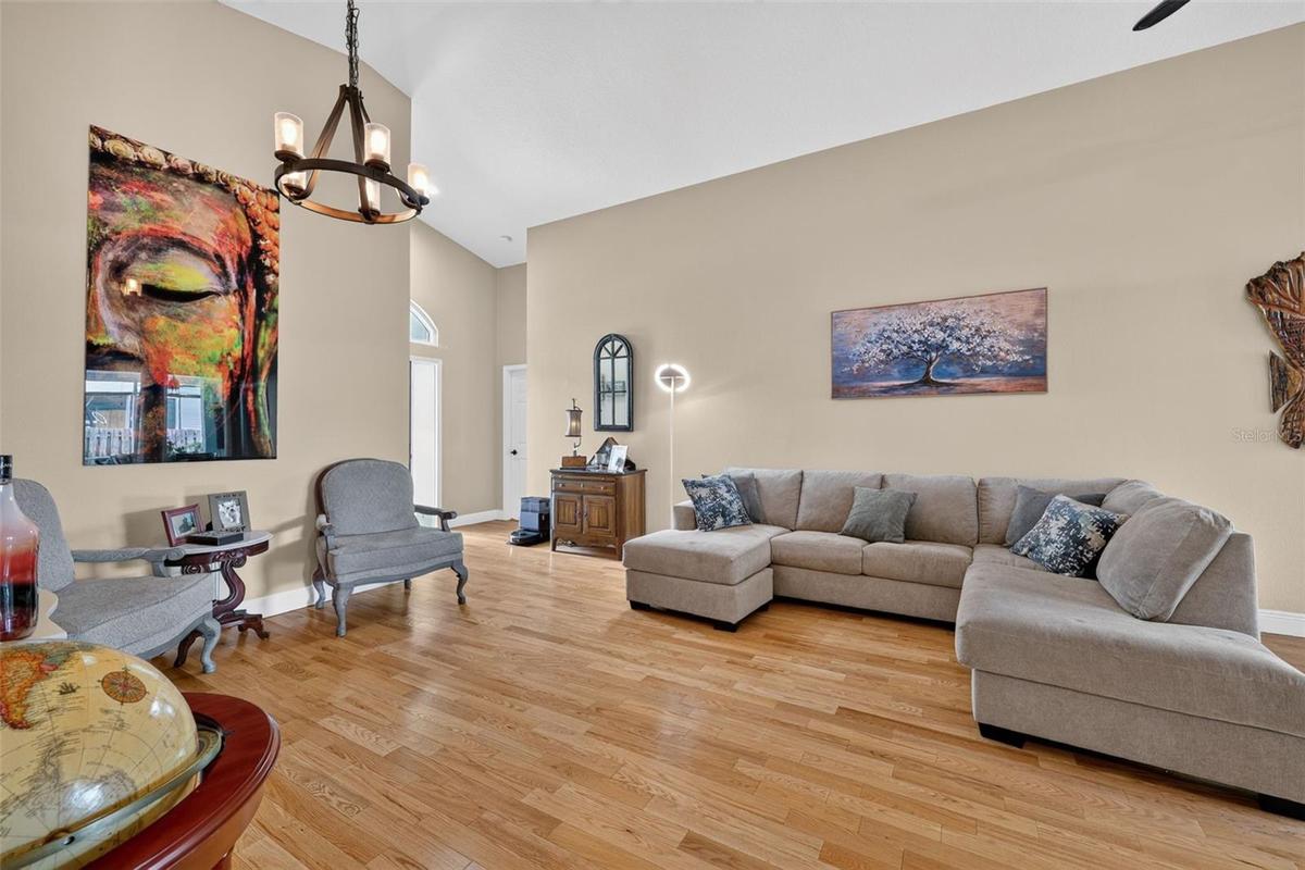 The living room is large and has plenty of light