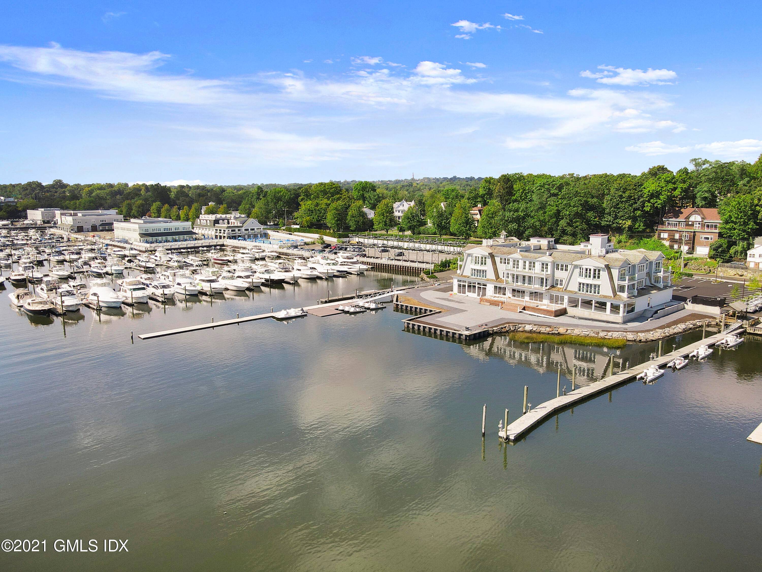 One of a kind direct Waterfront Shingle Style 12 unit condo association just completed and ready for summer occupancy.