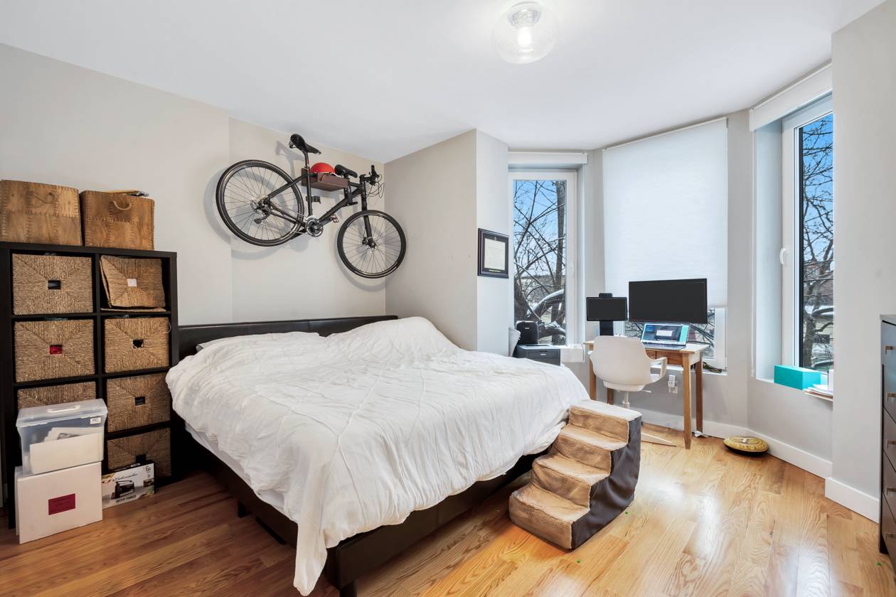 Beautifully renovated, sunny 2 bed, 2 full bath with stacked washer dryer in unit.