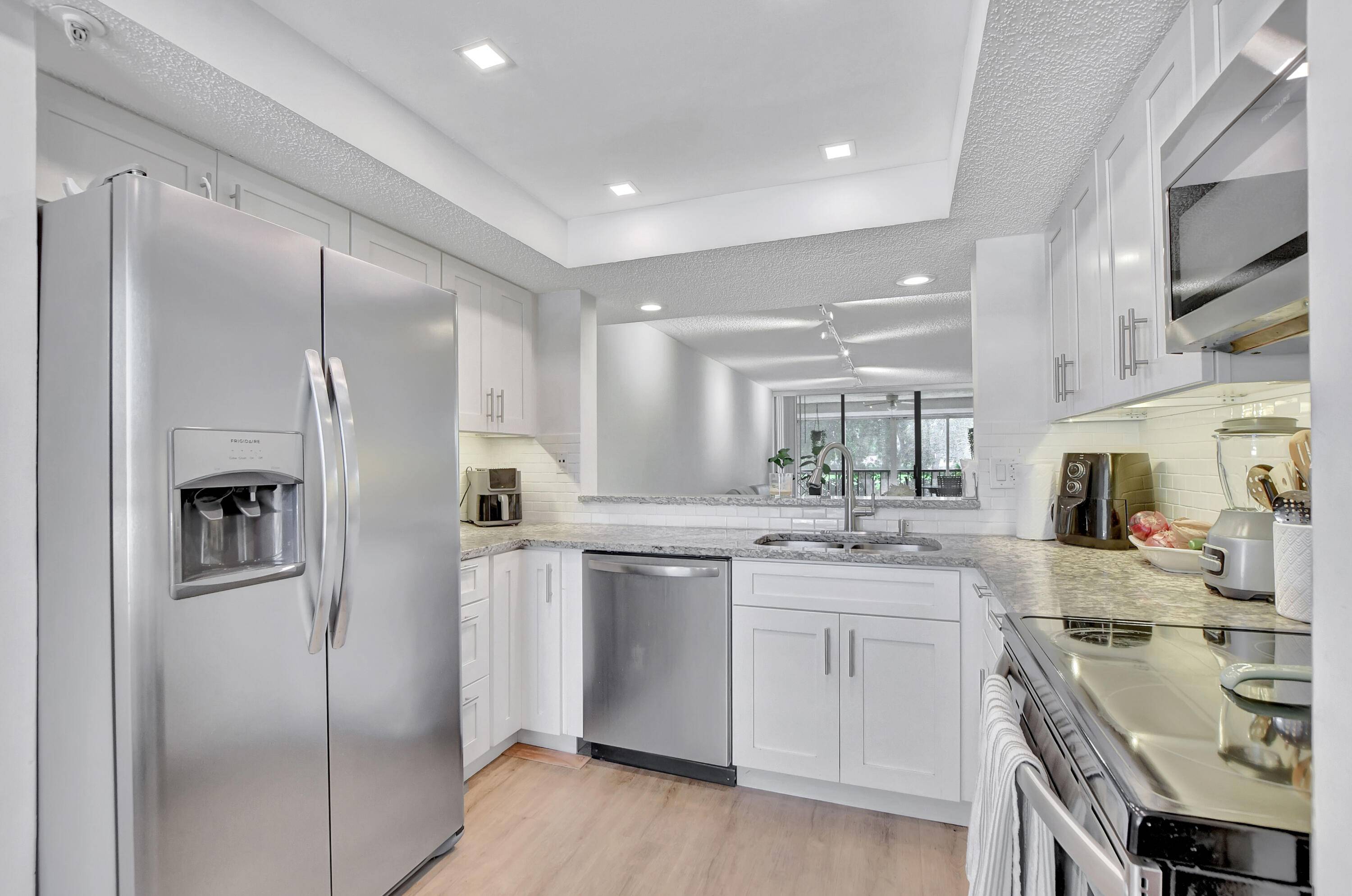 Beautiful 2 2 plus Den which was converted to a third bedroom can be easily converted back in Club Royale which is in the Heart of Boca Raton.