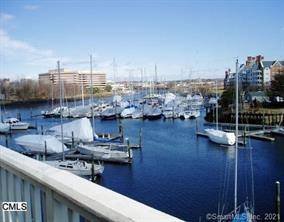 Stunning 2 bedroom waterfront townhouse in the gated Palmer Landing complex.