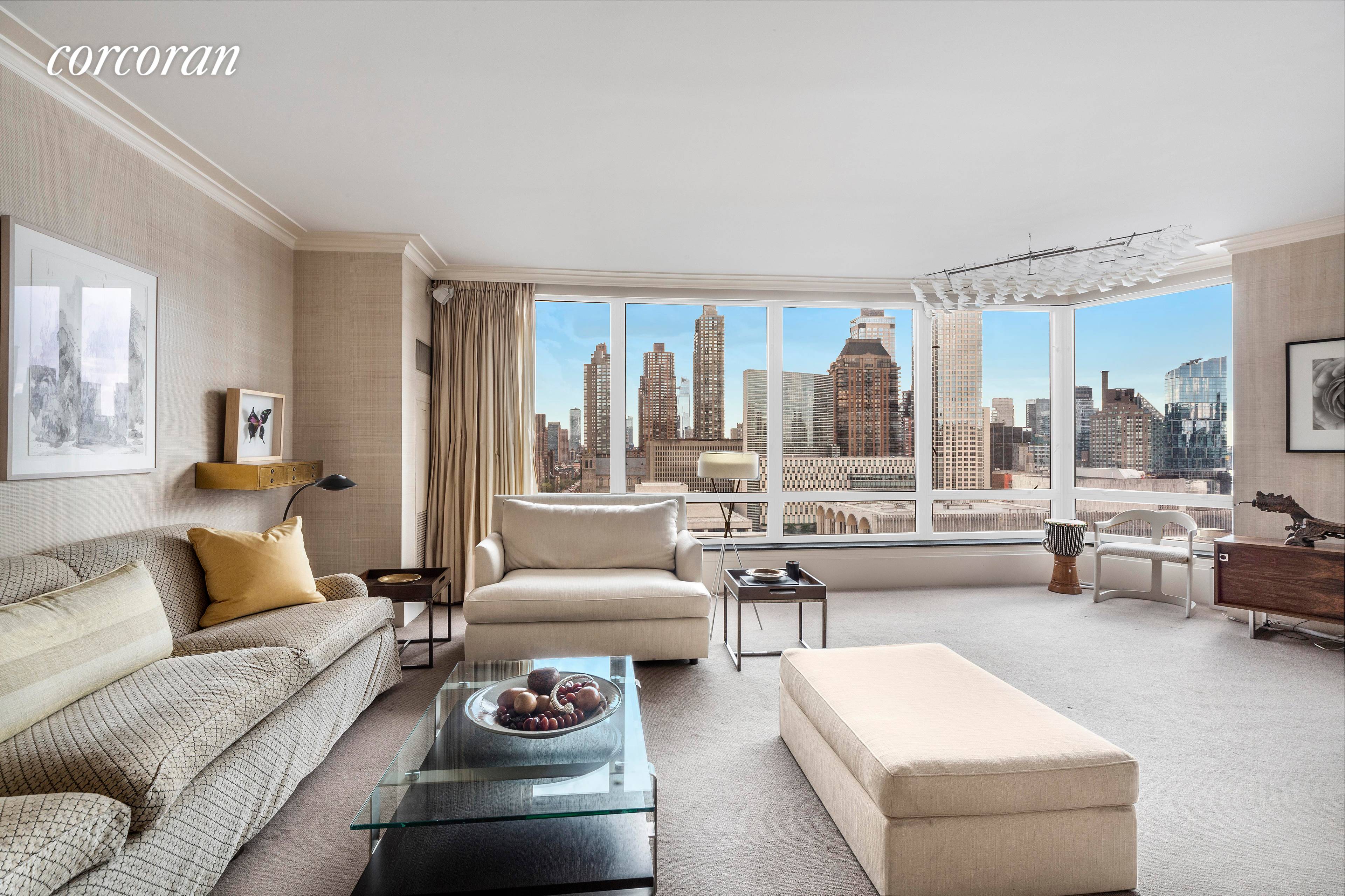 This spacious high floor condo at One Lincoln Square has sweeping south, west and east views directly over Lincoln Center and beyond over the Manhattan skyline.