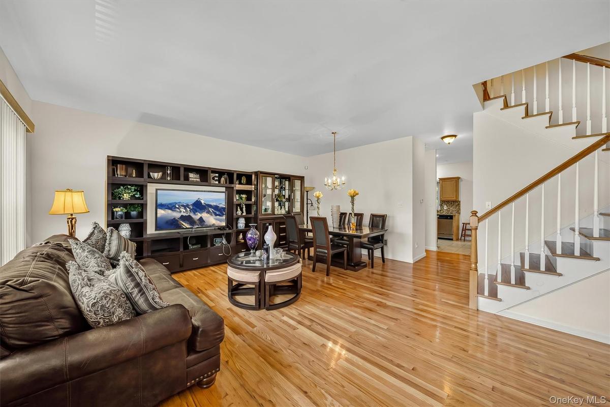 Notice the hardwood floors that run throughout the living area.