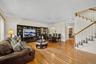 Notice the hardwood floors that run throughout the living area.
