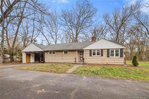 We love the yard and location of this property, conveniently tucked between I 84 and I 384.