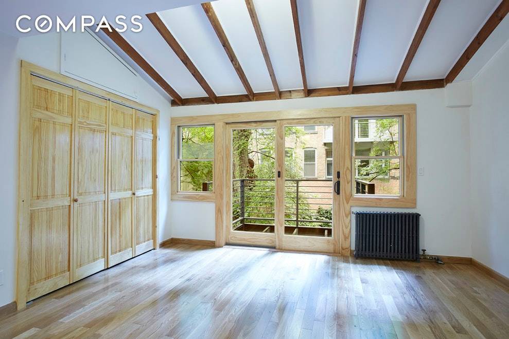 Immaculately renovated floor through in a bucolic Nomad brownstone.
