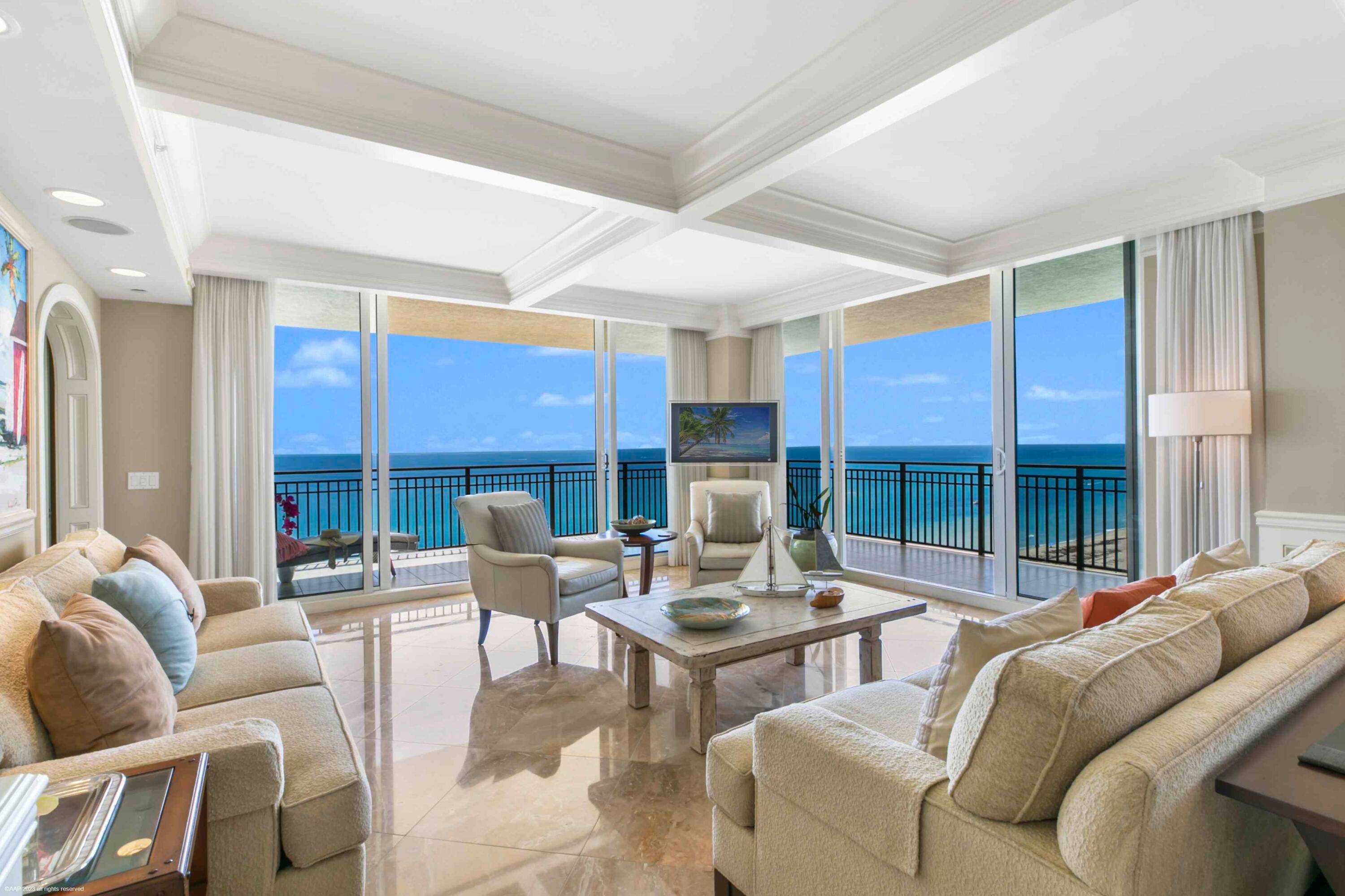 This rare 4 bedroom 5 bath ensuite, oceanfront gem at the Resort Residences of Singer Island, has spectacular direct, southeastern ocean and coastline views from every room.