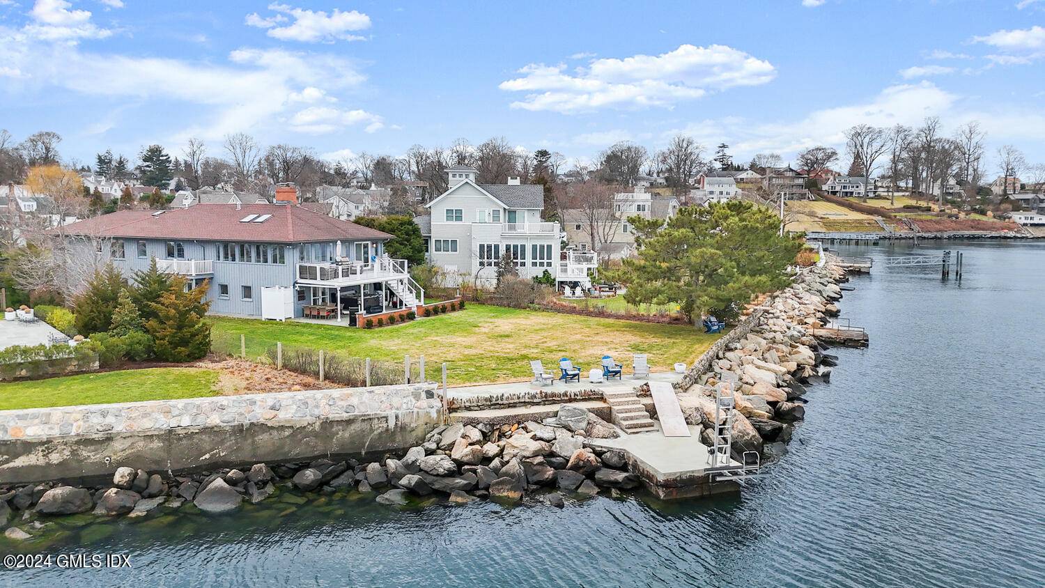 Spectacular direct waterfront home in prestigious Shippan Point with 270 degree water views.