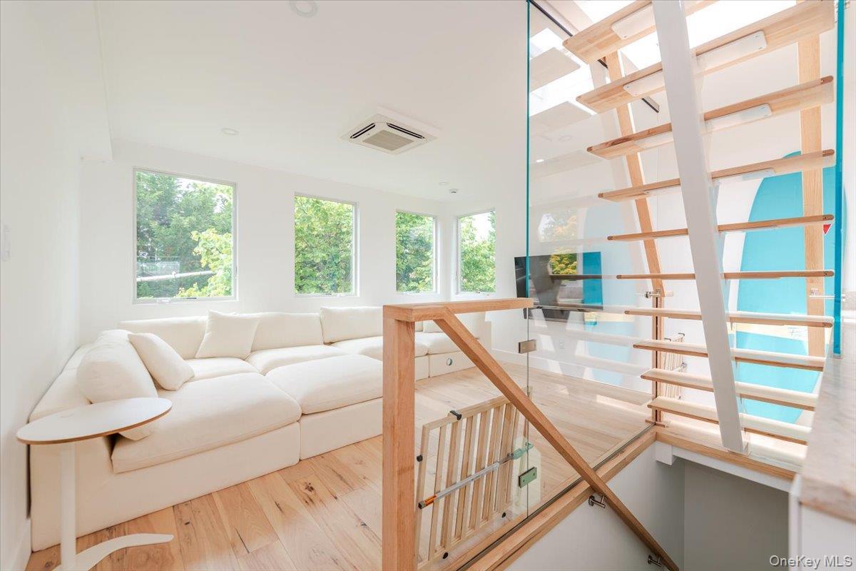 Living area with wood finished floors
