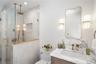 Full bath featuring vanity, a shower stall, and recessed lighting