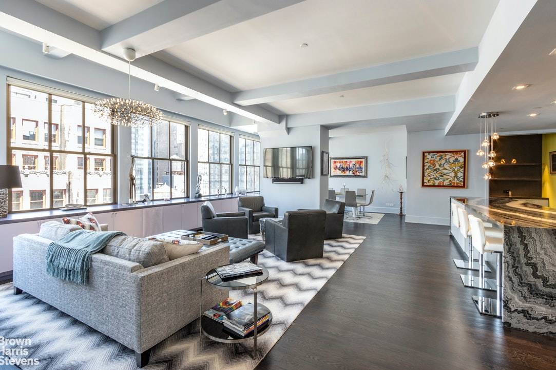 This high floor condominium home is perched above the bustle, overlooking Midtown to the North, Hudson Yards to the West, and Nomad to the East.