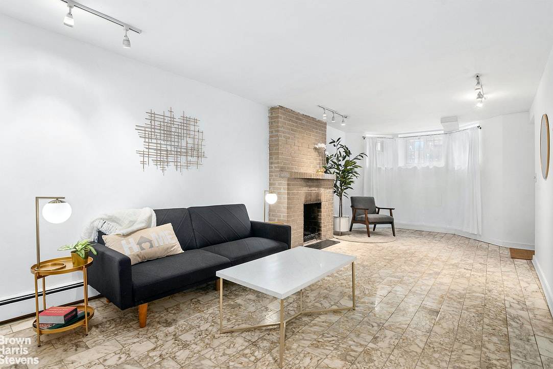 This spacious garden apartment over 21' wide building by 65' deep is currently laid out as a one bed, one bath with an enormous 47' deep and approx 1, 000 ...