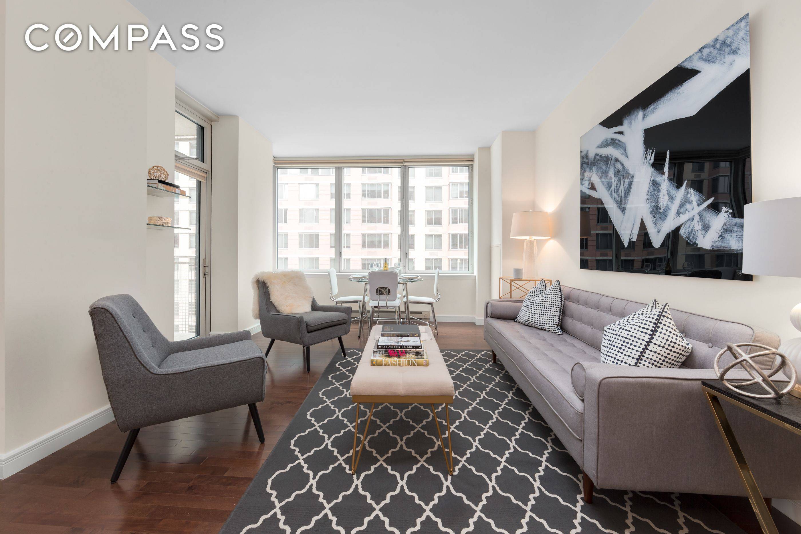 This stunning 2 bedroom apartment features hardwood floors, 3 Zone Central Heat AC, Washer Dryer, a large open chef s kitchen with etched glass cabinetry, crystalline countertops, stainless steel appliances, ...
