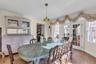 Dining space with french doors and light wood-type flooring