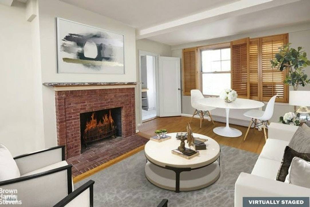 This classic prewar studio offers West Village living at its best.