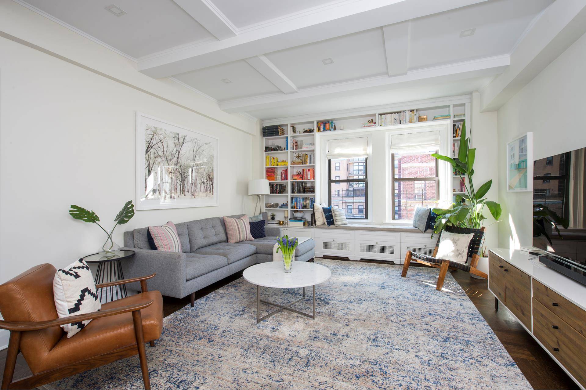 Move right into this stunning and spacious 2 bedroom 2 bathroom home recently renovated with a modern, yet elegant renovation that complements the charming, prewar character of the home.